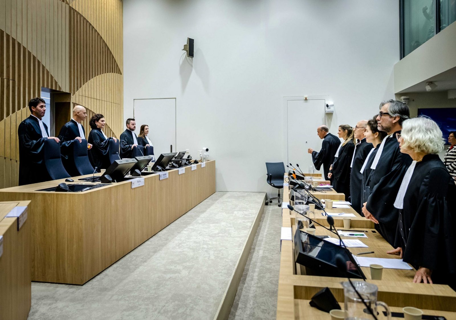 epa10310297 A court led by chairman H. Steenhuis (2-L) stands prior to the verdict at the Schiphol Judicial Complex in Badhoevedorp, Netherlands, 17 November 2022. A court in the Netherlands on 17 November is set to rule in the criminal trial over the downing of flight MH17. Four men are being prosecuted for their involvement in the crash of Malaysian Airlines passenger plane flight MH17, which was gunned down over Ukraine’s Donetsk region on 17 July 2014, killing all 298 people on board.  EPA/REMKO DE WAAL