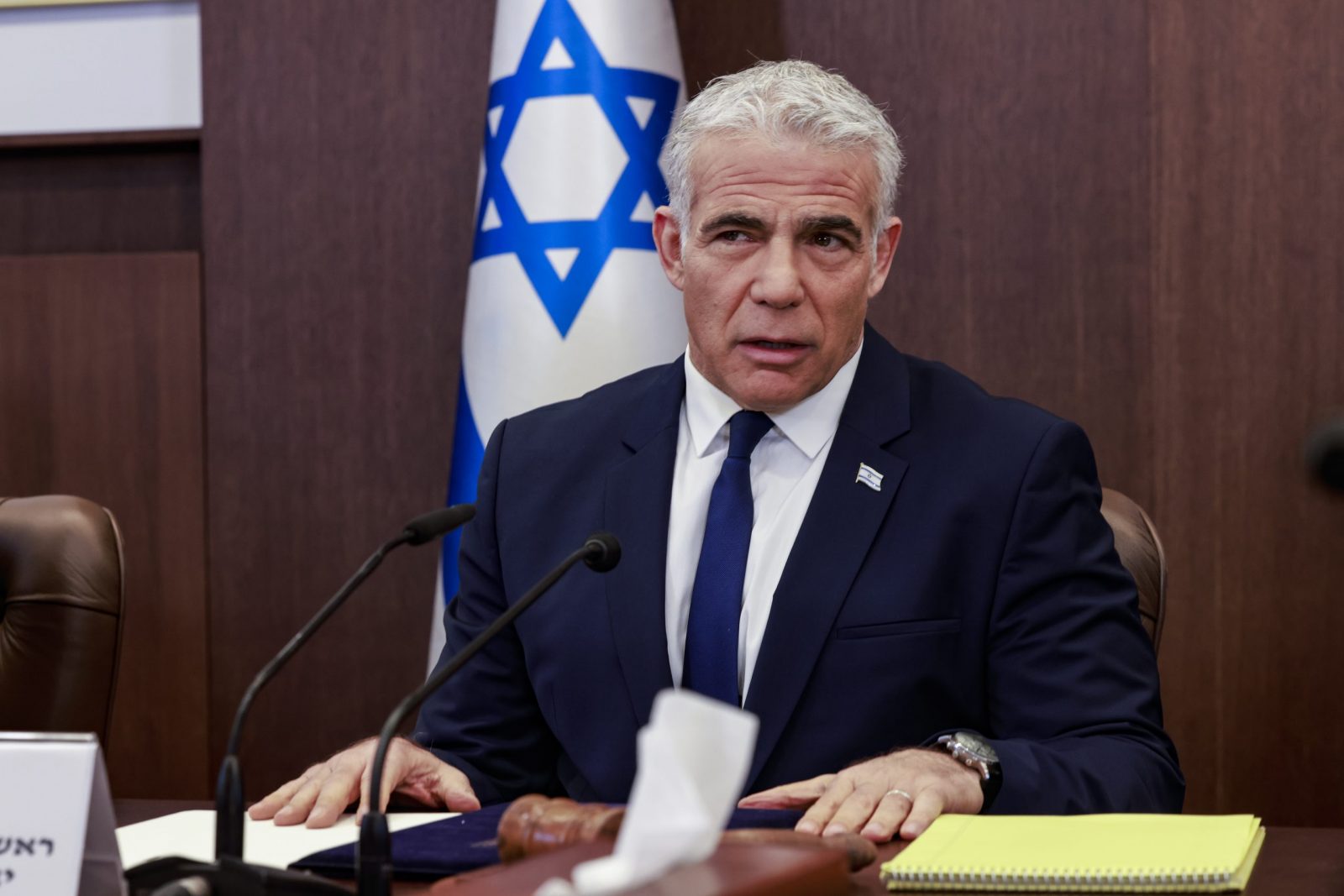 epa10315625 Israel’s outgoing Prime Minister Yair Lapid heads a cabinet meeting in Jerusalem, 20 November 2022.  EPA/MENAHEM KAHANA / POOL