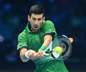 epa10316680 Novak Djokovic of Serbia in action against Casper Ruud of Norway during the singles final of the Nitto ATP Finals 2022 tennis tournament at the Pala Alpitour arena in Turin, Italy, 20 November 2022.  EPA/ALESSANDRO DI MARCO                   ITALY OUT