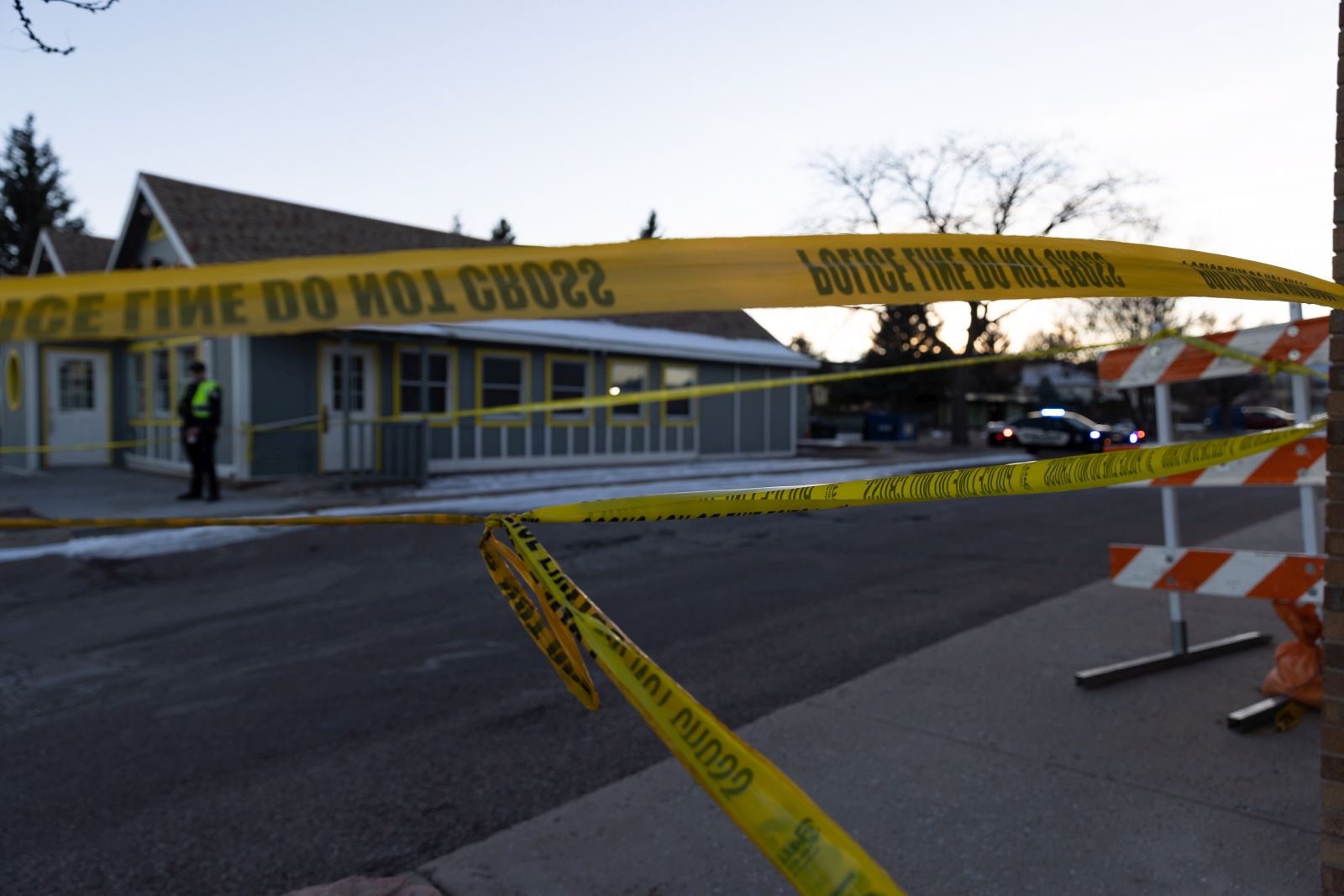 epa10319251 Police tape blocks off the area surrounding the LGBTQ nightclub Club Q, in Colorado Springs, Colorado, USA, 21 November 2022. According to police, at least five people were killed and 25 people were wounded during a mass shooting inside the nightclub on Saturday night.  EPA/LIZ COPAN