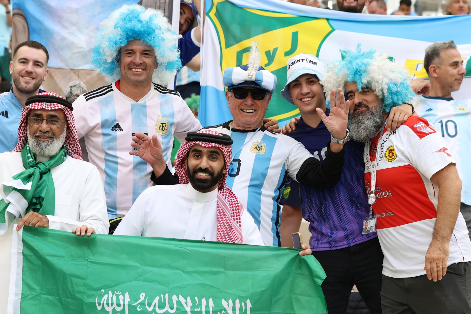 epa10319552 Supporters of Argentina and Saudi Arabia pose for photographs before the FIFA World Cup 2022 group C soccer match between Argentina and Saudi Arabia at Lusail Stadium in Lusail, Qatar, 22 November 2022.  EPA/Mohamed Messara