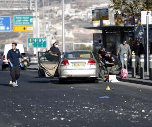 epa10321718 Israeli security forces stand at site of explosion at a bus stop near entrance to Jerusalem, Israel, 23 November 2022. According to Israeli police, at least 12 people were injured in two explosions at two bus stops near entrances to Jerusalem.  EPA/ATEF SAFADI