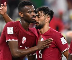epa10327757 Mohammed Muntari (L) of Qatar and teammate Tarek Salman react after losing the FIFA World Cup 2022 group A soccer match between Qatar and Senegal at Al Thumama Stadium in Doha, Qatar, 25 November 2022.  EPA/Noushad Thekkayil