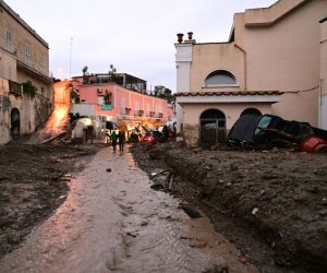 epa10330546 An area affected by a landslide in Ischia island, in the Gulf of Naples, Italy, 26 November 2022. A group of people are feared to be missing after heavy rain caused a landslide from the top of the Epomeo mountain, at a height of about 780 meters, and reached the seafront, overwhelming some parked cars and dragging them to the sea.  EPA/CIRO FUSCO ITALY OUT
