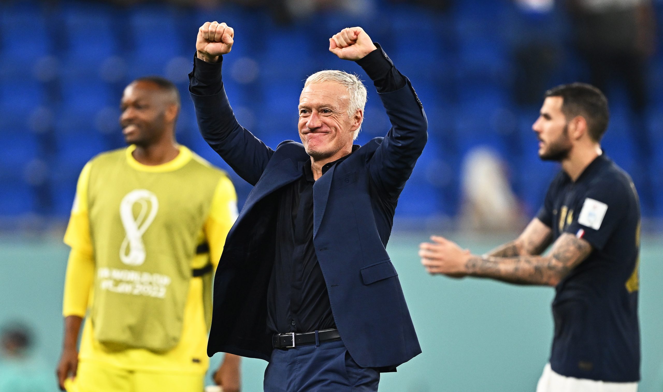 epa10330846 France's head coach Didier Deschamps (C) celebrates after winning the FIFA World Cup 2022 group D soccer match between France and Denmark at Stadium 947 in Doha, Qatar, 26 November 2022.  EPA/Noushad Thekkayil