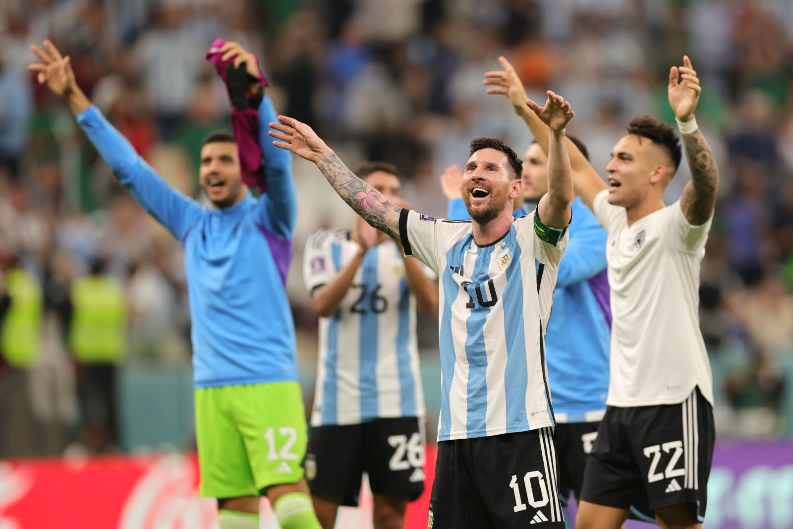 epa10331289 Lionel Messi of Argentina and teammates celebrate after the FIFA World Cup 2022 group C soccer match between Argentina and Mexico at Lusail Stadium in Lusail, Qatar, 26 November 2022.  EPA/Friedemann Vogel