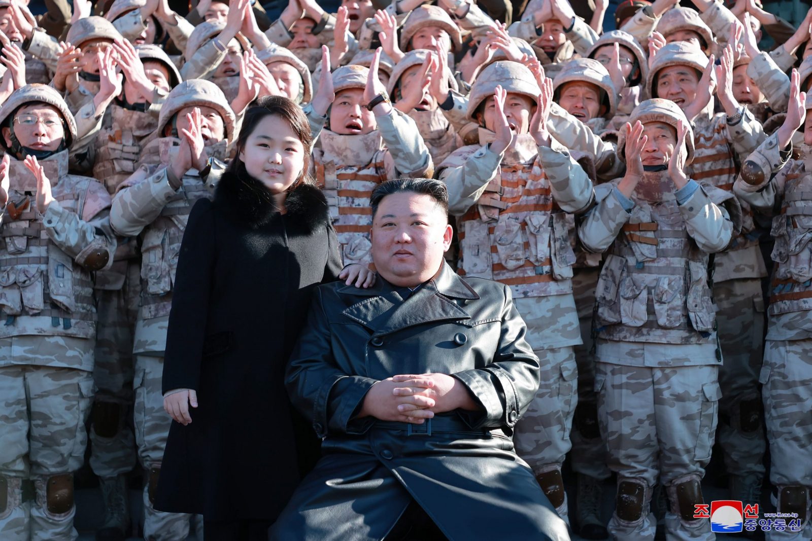 epa10331637 An undated photo released by the official North Korean Central News Agency (KCNA) on 27 November 2022 shows North Korean leader Kim Jong-un (front, C) posing with his daughter, presumed to be his second child, Ju-ae (C-L), during a photo session with the contributors to the successful test-fire of new-type ICBM Hwasongpho-17 at an undisclosed location in North Korea.  EPA/KCNA   EDITORIAL USE ONLY