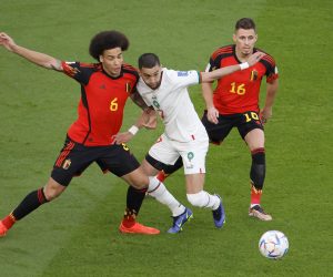 epa10332020 Axel Witsel (L) and Thorgan Hazard of Belgium in action against Hakim Ziyech (C) of Morocco during the FIFA World Cup 2022 group F soccer match between Belgium and Morocco at Al Thumama Stadium in Doha, Qatar, 27 November 2022.  EPA/Ronald Wittek