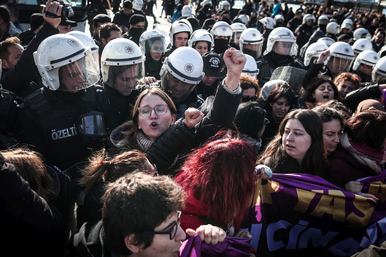 epa10332038 Turkish riot police detain protesters during a demonstration marking the International Day for the Elimination of Violence Against Women in Istanbul, Turkey, 27 November 2022. The International Day for the Elimination of Violence Against Women, celebrated on 25 November annualy, was established in an effort to raise awareness of the fact that women around the world are subject to rape, domestic violence and other forms of violence.  EPA/SEDAT SUNA