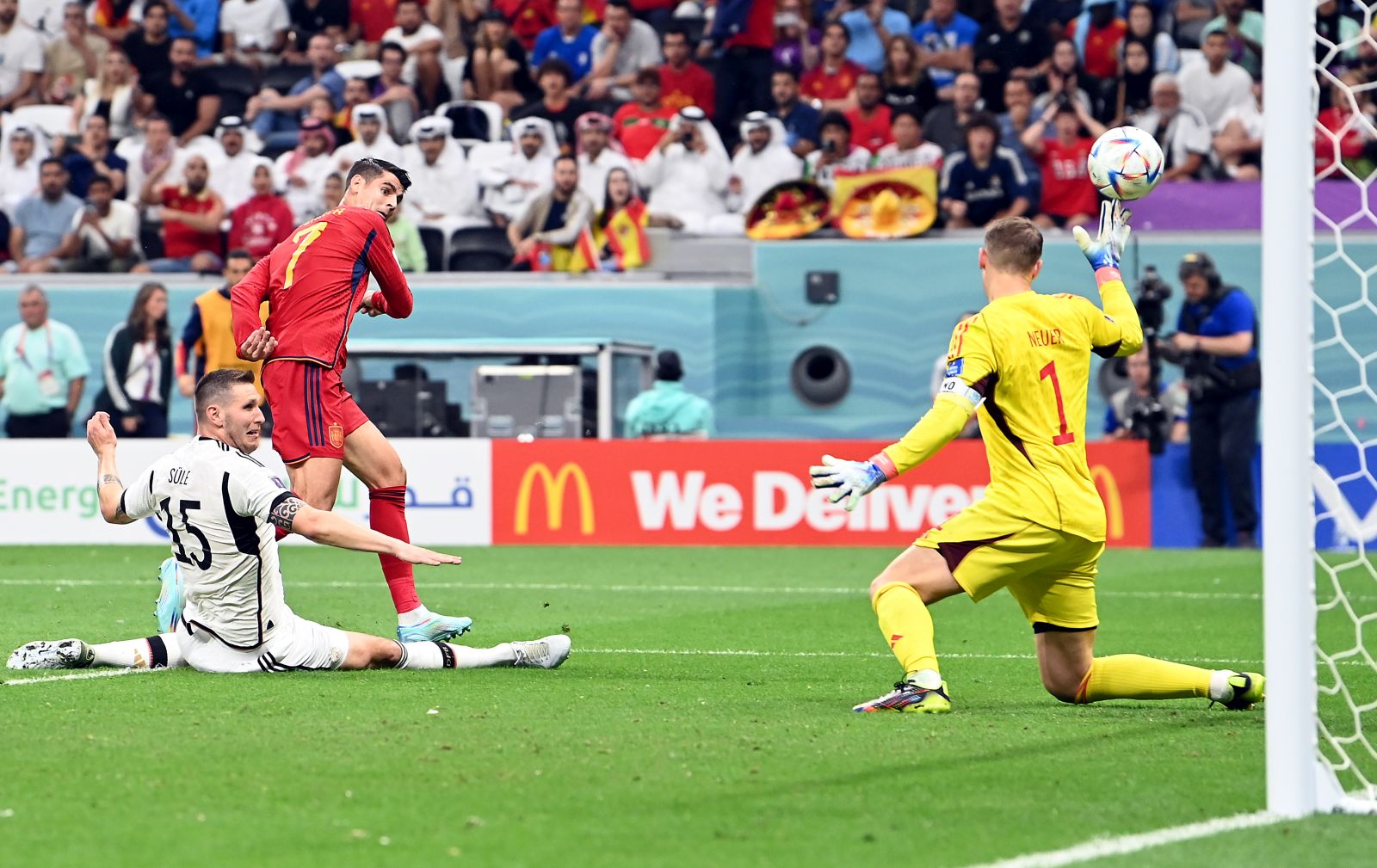 epa10333359 Alvaro Morata of Spain (2L) scores the 1-0 during the FIFA World Cup 2022 group E soccer match between Spain and Germany at Al Bayt Stadium in Al Khor, Qatar, 27 November 2022.  EPA/Georgi Licovski