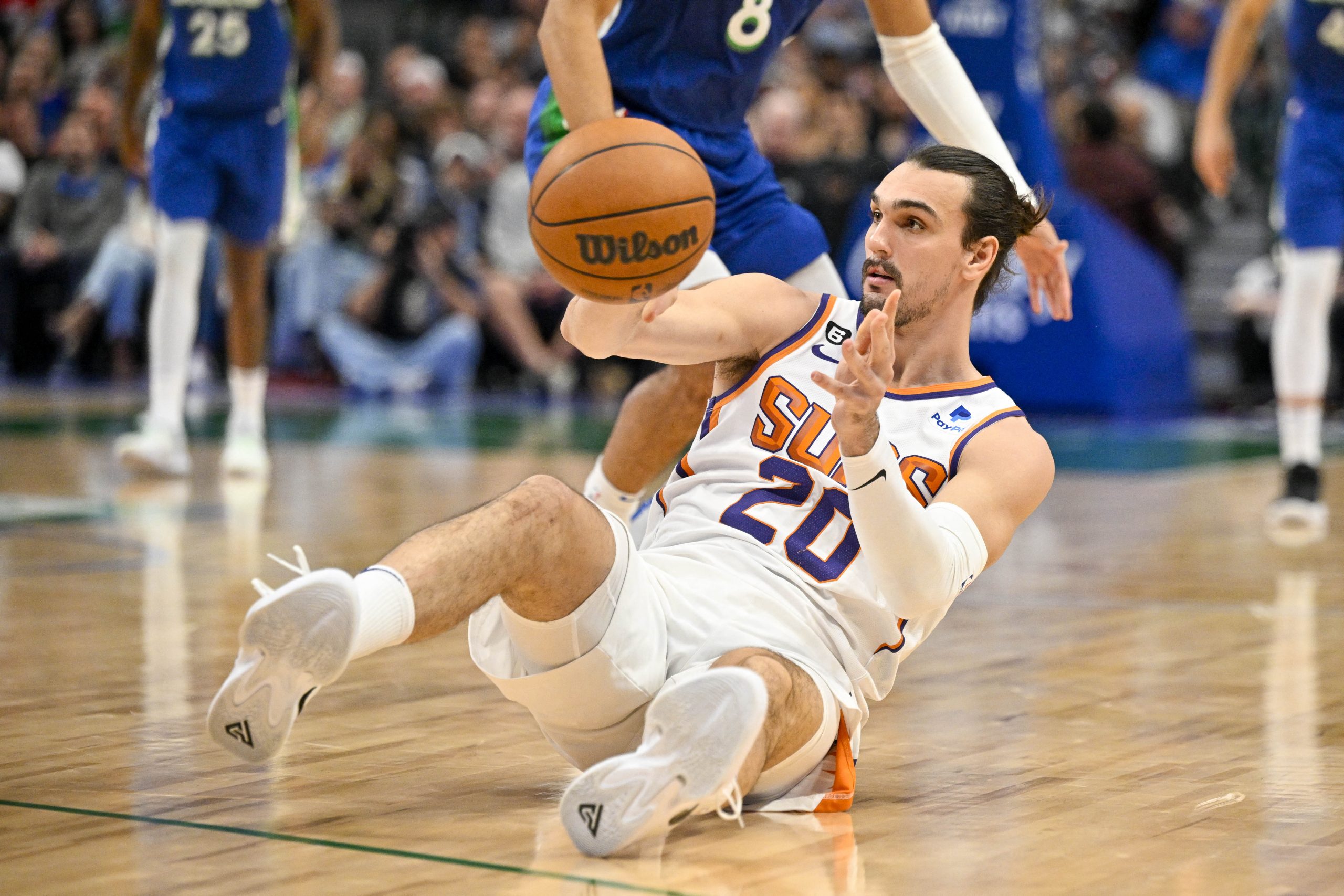 Dec 5, 2022; Dallas, Texas, USA; Phoenix Suns forward Dario Saric (20) passes the ball from the floor during the second half against the Dallas Mavericks at the American Airlines Center. Mandatory Credit: Jerome Miron-USA TODAY Sports