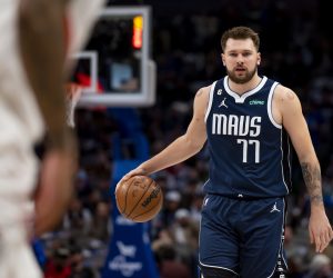 Dallas Mavericks guard Luka Doncic (77) brings the ball upcourt in the first half of an NBA basketball game against the Portland Trail Blazers in Dallas, Friday, Dec. 16, 2022. (AP Photo/Emil Lippe)