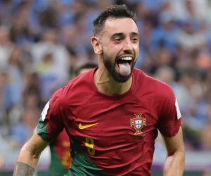 epa10335374 Bruno Fernandes of Portugal celebrates after scoring the 2-0 during the FIFA World Cup 2022 group H soccer match between Portugal and Uruguay at Lusail Stadium in Lusail, Qatar, 28 November 2022.  EPA/Abir Sultan