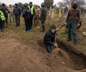 epa10336954  Local residents help the police, forensic experts, and war crime prosecutors to exhume the remains of a 15-year-old girl allegedly killed at the time of the Russian occupation, at a cemetery in the village of Pravdyne, outside Kherson, southern Ukraine, 29 November 2022. The girl was allegedly killed in April 2022 during the Russian occupation of the village in the Kherson region. Russian troops on 24 February entered Ukrainian territory, starting a conflict that has provoked destruction and a humanitarian crisis.  EPA/ROMAN PILIPEY