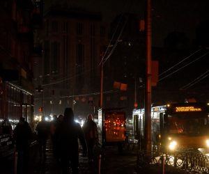 epa10337022 People walk on a street while the lights are switched off in Kyiv, Ukraine, 29 November 2022. Russian troops on 24 February entered Ukrainian territory, starting a conflict that has provoked destruction and a humanitarian crisis.  EPA/OLEG PETRASYUK