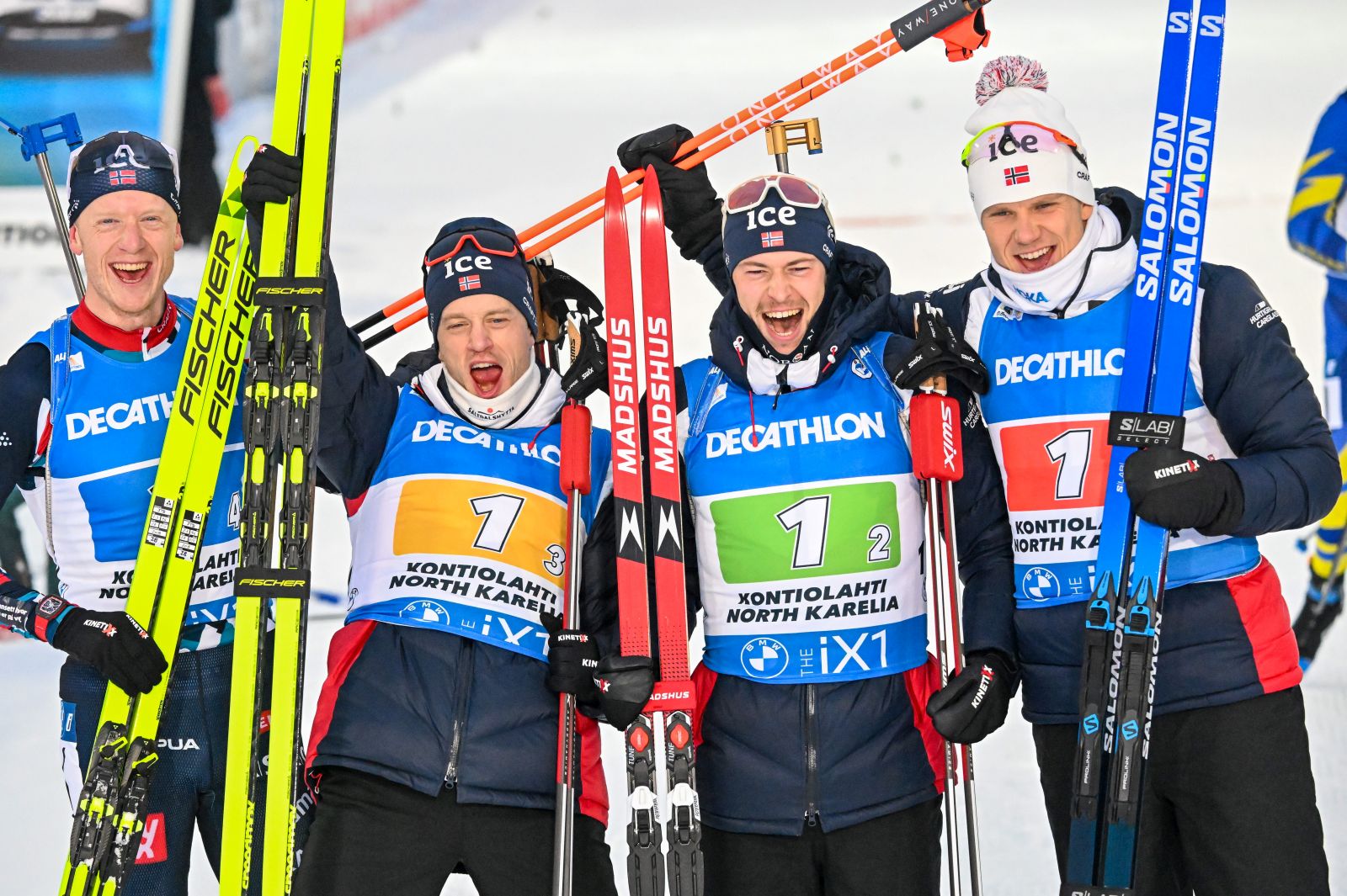 epa10341083 Team Norway celebrates in the finish area after winning the the men's 4x7.5km Relay race of the IBU Biathlon World Cup in Kontiolahti, Finland, 01 December 2022.  EPA/KIMMO BRANDT