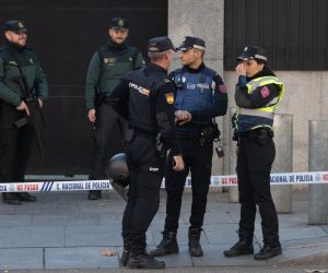 epa10341610 Members of Spanish Guardia Civil and National Police stand guard at the US Embassy in Madrid, Spain, 01 December 2022. A bomb letter has been found at the US Embassy in Madrid, addressed to the US ambassador. So far, five different bomb letters have been found within the last few hours, some intended to be received by Spanish prime minister, another one sent to the Spanish Ministry of Defense, two to the Ukrainian and US embassies in Madrid, and one more received by a company in the northern city of Zaragoza. ATTENTION EDITORS: FACES PIXELATED AT SOURCE.  EPA/FERNANDO VILLAR