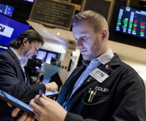 epa10344306 Traders work on the floor of the New York Stock Exchange in New York, New York, USA, 02 December 2022. The Dow Jones industrial average was down over 200 points in early trading as investors reacted to the US government’s monthly job report.  EPA/JUSTIN LANE