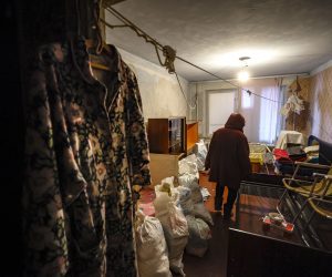 epa10354587 Mariupol resident, 76 years old Lidia, gathers goods and personal possessions before moving out of her apartment at a damaged building in Mariupol, Ukraine, 07 December 2022 (Issued 08 December 2022). Mariupol had seen a long battle for its control between the Ukrainian forces and the Russian army and Russian backed self proclaimed Donetsk People’s Republic (DPR) as well as a siege, the hostilities lasted from February to the end of May 2022 killing thousands of people and destroying most of the city in the process. A ccording to the DPR government which took control after May 2022, more than five thousand builders are currently working in Mariupol, they expect the city to be completely rebuilt in a three years time.  EPA/SERGEI ILNITSKY