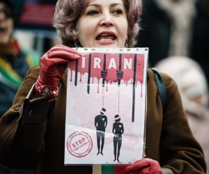 epa10359146 A woman holds a placard during a rally in Berlin, Germany, 10 December 2022. The women and girls rights non-profit-organization Terre des Femmes and other groups called for a rally in solidarity with protesters in Iran, on the occasion of the international Human Rights Day. Further rallies were expected to take place in Hamburg, Cologne, Frankfurt, Stuttgart und Munich.  EPA/CLEMENS BILAN