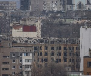 epa10360631 A general view of the buildings in Mariupoll, Ukraine, 10 December 2022 (issued 11 December 2022). An estimate 250,000 inhabitants have left the city, about 300,000 still remain. During the hostilities, up to 70 percent of the housing stock of Mariupol was destroyed and about 5,000 civilians were killed due to fighting and shelling, Konstantin Ivashchenko, the new mayor of the city, said. City authorities prepare residential buildings for winter and change all central heating systems in Mariupol, where by the end of the year at least 1,000 residential buildings, social and cultural facilities will be connected to heat, said Russian Deputy Prime Minister Marat Khusnullin. The government of the self-proclaimed Donetsk People's Republic (DPR) reported that 129,000 square meters of new housing will appear next year in Mariupol. More than 5,000 builders are working on the restoration of the city. Mariupol is expected to be completely rebuilt in three years.  EPA/SERGEI ILNITSKY
