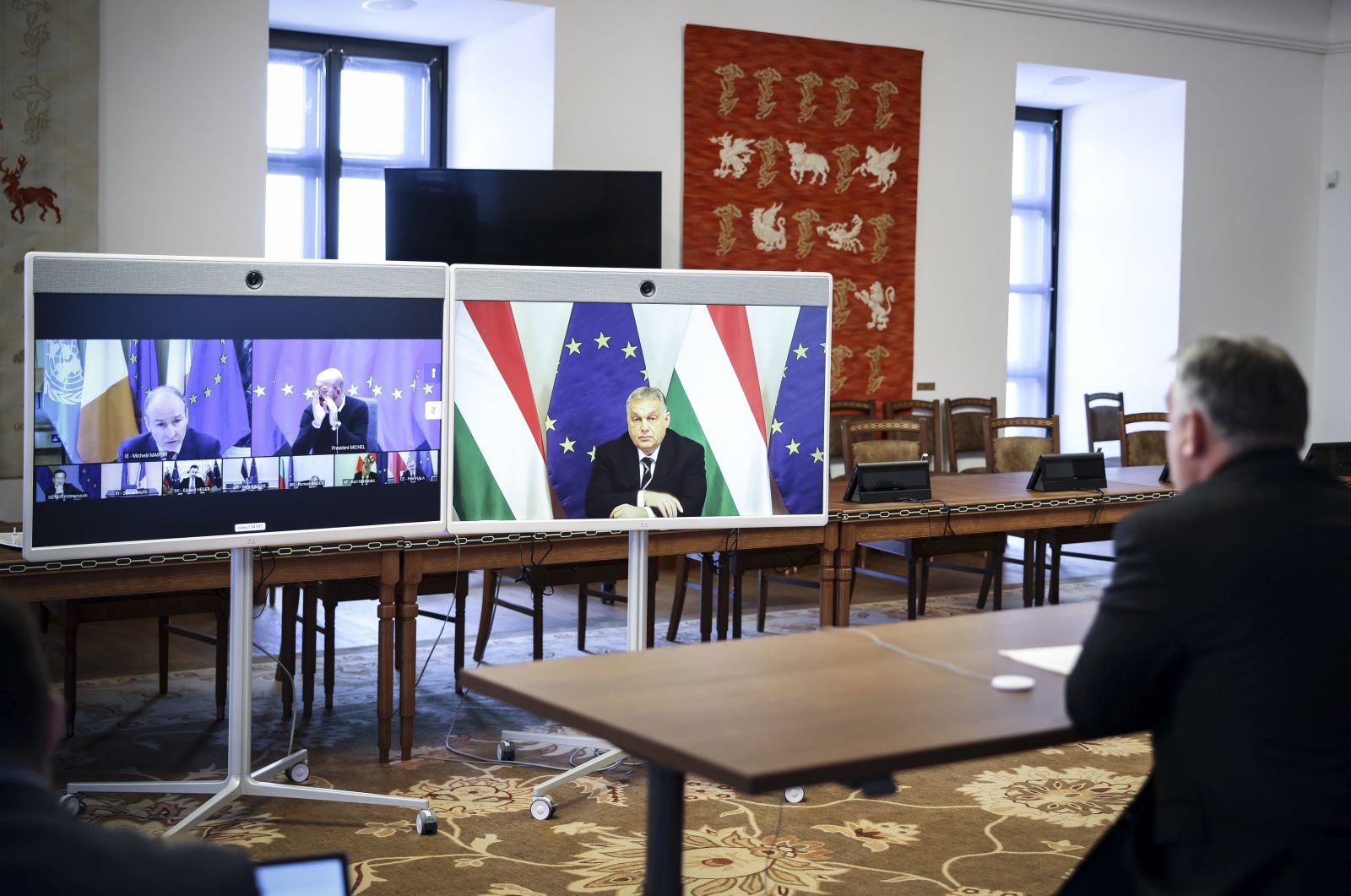 epa10361748 A handout photo made available by the Hungarian PM's Press Office, shows Prime Minister of Hungary Viktor Orban (R) attends a meeting with European Council President Charles Michel via a video conference in the cabinet headquarters in Budapest, Hungary, 12 December 2022. The leaders held their talk in preparation for the upcoming EU summit on 15-16 December.  EPA/ZOLTAN FISCHER / HUNGARIAN PM OFFICE / HANDOUT HANDOUT - EDITORIAL USE ONLY - NO SALESHUNGARY OUT HANDOUT EDITORIAL USE ONLY/NO SALES