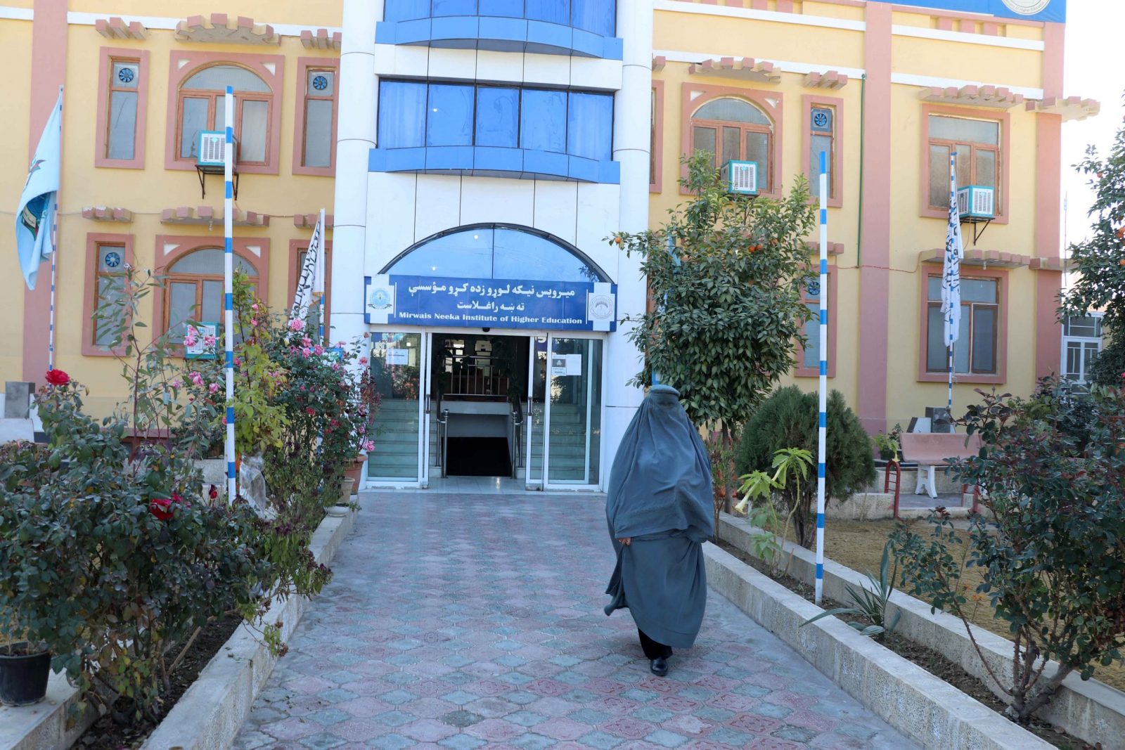 epa10375382 An Afghan female student leaves the Mirwais Neeka Institute of Higher Education in Kandahar, Afghanistan, 21 December 2022. The ruling Taliban has banned women from attending university in Afghanistan, according to an order issued on 20 December 2022. After regaining power, the Taliban initially insisted that women's rights would not be hindered, before barring girls over the age of 12 from attending school earlier this year. The UN envoy to that country, Roza Otunbayeva, once again condemned the closure of secondary schools for girls, a move which she said would mean there would be no more female students eligible for university within two years.  EPA/STRINGER