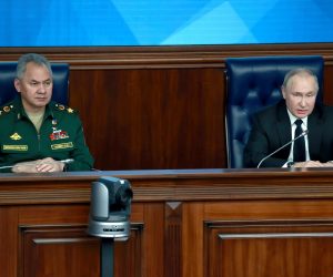 epa10375650 Russian President Vladimir Putin (R) and Defence Minister Sergei Shoigu attend an expanded meeting of the Russian Defence Ministry Board at the National Defence Control Centre in Moscow, Russia, 21 December 2022. Sergei Shoigu announced plans to put into service next year 22 launchers with intercontinental ballistic missiles Yars, Avangard and Sarmat, three Tu-160M strategic bombers, five submarines and 12 ships. Russian President Vladimir Putin supported the proposals made by the country's Defense Minister Sergei Shoigu on reforming the armed forces and instructed to report on the results of their discussion at the board of the department.  EPA/SERGEY FADEICHEV/KREMLIN / POOL MANDATORY CREDIT