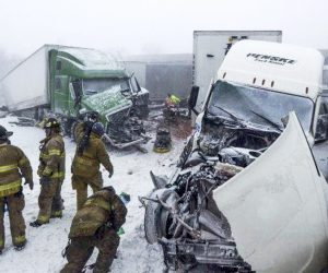 epa10377715 A handout photo made available by the Ohio Highway Patrol shows rescuers at the scene of a multi-vehicle crash in which four people died and left multiple people injured on the Ohio Turnpike in Erie County, Ohio, USA, 23 December 2022 (issued 24 December 2022.) Much of the US is under a winter storm that has brought sub-freezing temperature, power outages, and icy conditions.  EPA/OHIO HIGHWAY PATROL HANDOUT  HANDOUT EDITORIAL USE ONLY/NO SALES