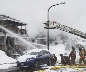 epa10378753 Firefighters work to extinguish a house fire on Lonsdale Road as the area continues to deal with the effects of a massive winter storm which has affected large portions of the United States, continues in Buffalo, New York, USA, 26 December 2022. Much of the United States experienced some sort of winter weather this week as result of the large storm which was generated by a bomb cyclone, the meteorological phenomenon when the atmospheric pressure quickly drops in a strong storm.  EPA/JOSH THERMIDOR