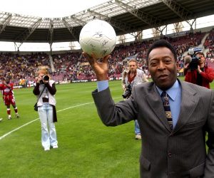 epa10382400 (FILE) - Brazilian soccer legend Pele, whos birth name is Edson Arantes do Nascimento, jokes with photographers before the match between Swiss teams Servette FC and BSC Young Boys, in the Geneva Stadium, in Geneva, Switzerland, 18 April 2004 (issued 30 December 2022). According to his agent, Pele, whose proper name is Edson Arantes do Nascimento, died on 28 December 2022 at age 82.  EPA/LAURENT GILLIERON