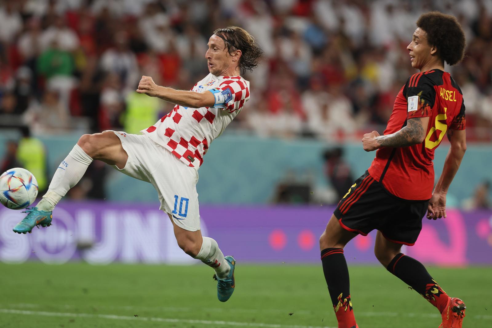Croatian Luka Modric and Belgium's Axel Witsel pictured in action during a soccer game between Belgium's national team the Red Devils and Croatia, the third and last game in Group F of the FIFA 2022 World Cup in Al Rayyan, State of Qatar on Thursday 01 December 2022.
 BELGA PHOTO BRUNO FAHY Photo: BRUNO FAHY/PIXSELL