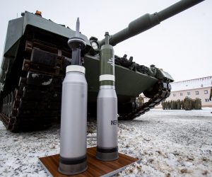 epa10375564 Ammunition standing in front of a Leopard 2A4 tank during a ceremony for the hand over of the symbolic key of the tank to the Czech army, in Praslavice, Czech Republic, 21 December 2022. The Czech Republic is to receive a total of 14 Leopard 2A4 tanks and a Bueffel armored recovery vehicle as a gift from Germany under the German government's 'Ringtausch' programme in return for deliveries of older tanks from Czech army depots to Ukraine. In addition to the tanks, the delivery will include an initial package of spare parts, ammunition and a three-year service support from the supplier, which includes training of Czech soldiers. The value of the donation exceeds 3.85 billion Czech crown (159 million euro). The rest of the military equipment is expected to be delivered to the Czech Republic next year.  EPA/VLADIMIR PRYCEK