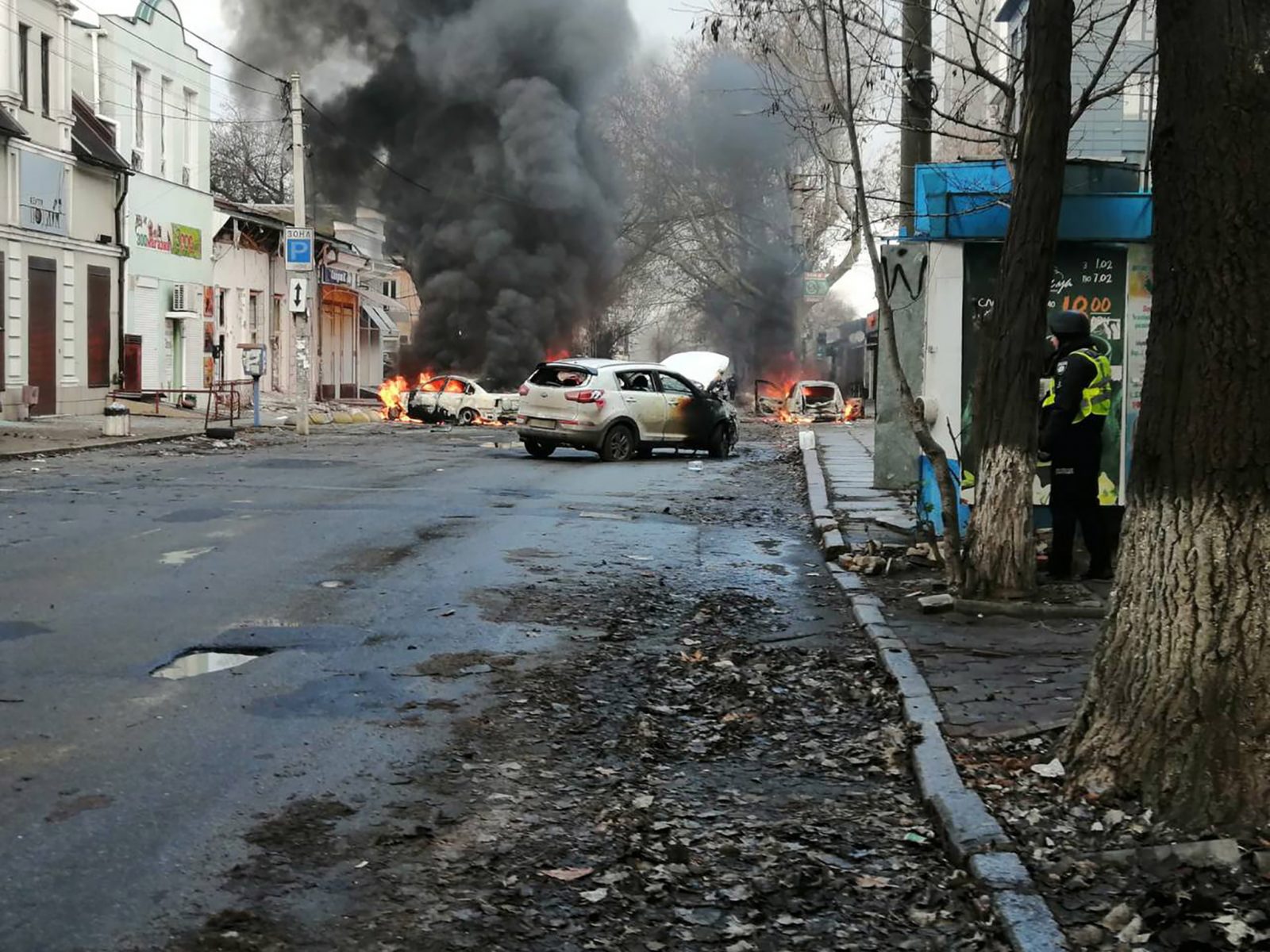 epa10377632 A handout photo released by the press service of the State Emergency Service (SES) of Ukraine shows cars burning on a street after shelling hit Kherson, southern Ukraine, 24 December 2022, amid Russia's invasion. At least seven people were killed and 58 others injured after Russian strikes targeted the southern Ukrainian city on 24 December, the head of the Kherson regional military administration, Yaroslav Yanushevich wrote on telegram. Russian troops entered Ukraine on 24 February 2022 starting a conflict that has provoked destruction and a humanitarian crisis.  EPA/STATE EMERGENCY SERVICE OF UKRAINE HANDOUT -- BEST QUALITY AVAILABLE -- MANDATORY CREDIT: STATE EMERGENCY SERVICE OF UKRAINE --