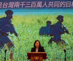 epa10379040 Taiwan President Tsai Ing-wen speaks in front of a screen showing defense forces, during a press conference in Taipei, Taiwan, 27 December 2022. Tsai addresses national security issues including the recent Chinese military incursion above Taiwan airspace on 26 December.  EPA/RITCHIE B. TONGO