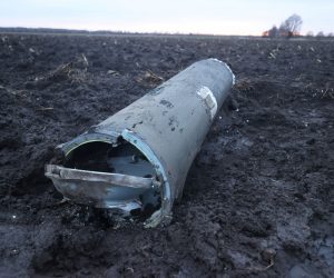 epa10382520 A handout photo made available by Belta news agency shows a fragment of a missile in a field outside the village of Harbacha, Grodno region, Belarus, 29 December 2022 (issued 30 December 2022). The press service of the Ministry of Defense of Belarus said that a missile fired from the territory of Ukraine was shot down on 29 December morning by air defense forces after it crossed Belarus' border and entered its airspace. According to a Belarus investigation, it was preliminary established that the wreckage belonged to an S-300 anti-aircraft guided missile fired from the territory of Ukraine.  EPA/VADZIM YAKUBIONAK/BELTA HANDOUT -- MANDATORY CREDIT -- HANDOUT EDITORIAL USE ONLY/NO SALES