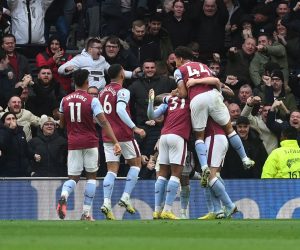 epa10385497 Emiliano Buendia of Villa celebrates with teammates after scoring the opening goal during the English Premier League soccer match between Tottenham Hotspur and Aston Villa in London, Britain, 01 January 2023.  EPA/Neil Hall EDITORIAL USE ONLY. No use with unauthorized audio, video, data, fixture lists, club/league logos or 'live' services. Online in-match use limited to 120 images, no video emulation. No use in betting, games or single club/league/player publications