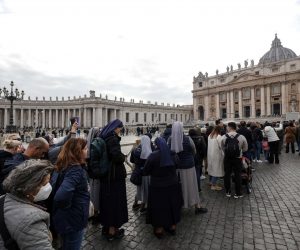 epa10386533 Nuns, priests and faithful in Saint Peter's Square to pay the last tribute to Pope emeritus Benedict XVI, Vatican City, 02 January 2023.  EPA/GIUSEPPE LAMI