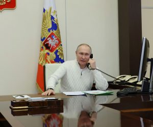 epa10391046 Russian President Vladimir Putin speaks on the phone to seven-year-old David Shmelev from Stavropol Krai region, who took part in the New Year Tree of Wishes nationwide charity campaign, at the Novo-Ogaryovo state residence, outside Moscow, Russia, 05 January 2023. Putin on 05 January called for a 36-hour ceasefire in Ukraine to mark Orthodox Christmas.  EPA/MIKHAEL KLIMENTYEV / SPUTNIK / KREMLIN POOL MANDATORY CREDIT