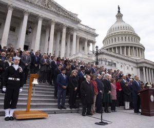 epa10392701 Members of Congress and families of fallen US Capitol Police observe a moment of silence during a ceremony to observe the second anniversary of the 06 January attack on the United States Capitol, at the East Front steps of the US Capitol in Washington, DC, USA, 06 January 2023. The second anniversary of the attack by insurrections occurs weeks after the House Select Committee to Investigate the January 6 Attack on the Capitol referred former US President Donald J. Trump and others to the US Justice Department for criminal investigations.  EPA/MICHAEL REYNOLDS