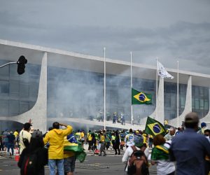 epa10396226 Bolsonaro supporters storm the National Congress in Brasilia, Brazil, 08 January 2023. Hundreds of supporters of former Brazilian President Jair Bolsonaro invaded the headquarters of the National Congress, and also Supreme Court and the Planalto Palace, seat of the Presidency of the Republic, in a demonstration calling for a military intervention to overthrow President Luiz Inacio Lula da Silva. The crowd broke through the cordons of security forces and forced their way to the roof of the buildings of the Chamber of Deputies and the Senate, and some entered inside the legislative headquarters.  EPA/ANDRE BORGES