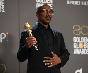 epa10399357 US actor Eddie Murphy poses with the Cecil B. DeMille Award in the press room during the 80th annual Golden Globe Awards ceremony in Beverly Hills, California, USA, 10 January 2023. Artists in various film and television categories are awarded Golden Globes by the Hollywood Foreign Press Association.  EPA/CAROLINE BREHMAN