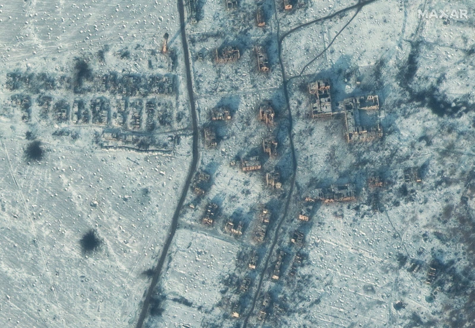 epa10400572 A handout satellite image made available by Maxar Technologies shows destroyed buildings in Soledar, Ukraine, 11 January 2023. Ukraine's President Volodymyr Zelenskyy has said that fighting was continuing in Soledar, an eastern Ukrainian city that Russian mercenary group Wagner claimed to control earlier, and that the front was holding.  EPA/MAXAR TECHNOLOGIES HANDOUT -- MANDATORY CREDIT: SATELLITE IMAGE 2022 MAXAR TECHNOLOGIES -- THE WATERMARK MAY NOT BE REMOVED/CROPPED -- HANDOUT EDITORIAL USE ONLY/NO SALES