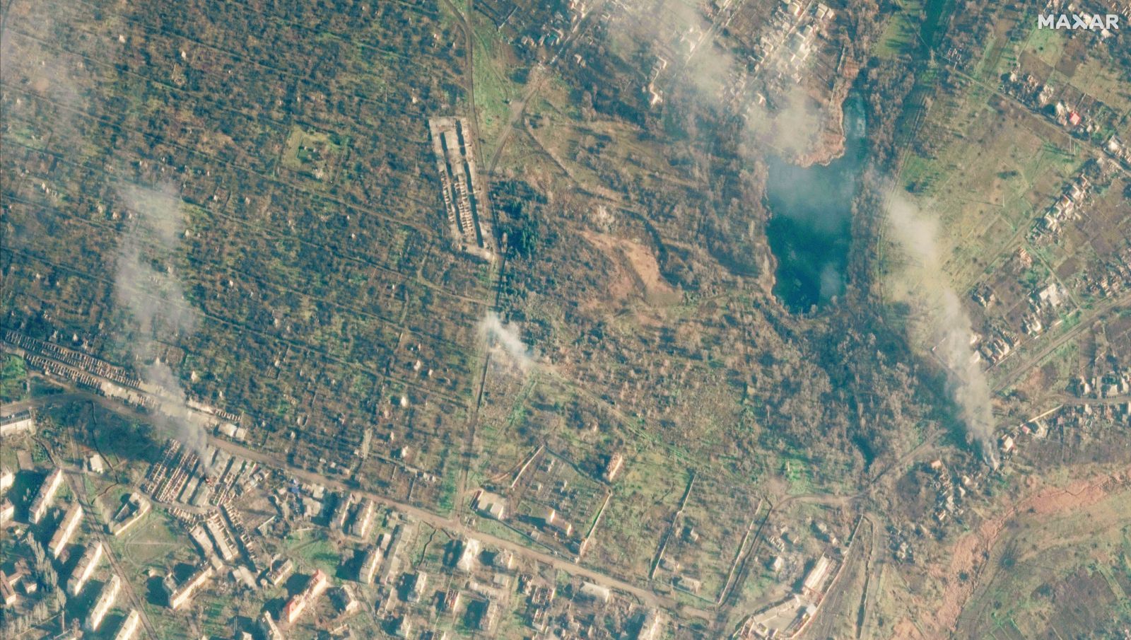 epa10400571 A handout satellite image made available by Maxar Technologies shows smoldering buildings in Soledar, Ukraine, 11 January 2023. Ukraine's President Volodymyr Zelenskyy has said that fighting was continuing in Soledar, an eastern Ukrainian city that Russian mercenary group Wagner claimed to control earlier, and that the front was holding.  EPA/MAXAR TECHNOLOGIES HANDOUT -- MANDATORY CREDIT: SATELLITE IMAGE 2022 MAXAR TECHNOLOGIES -- THE WATERMARK MAY NOT BE REMOVED/CROPPED -- HANDOUT EDITORIAL USE ONLY/NO SALES