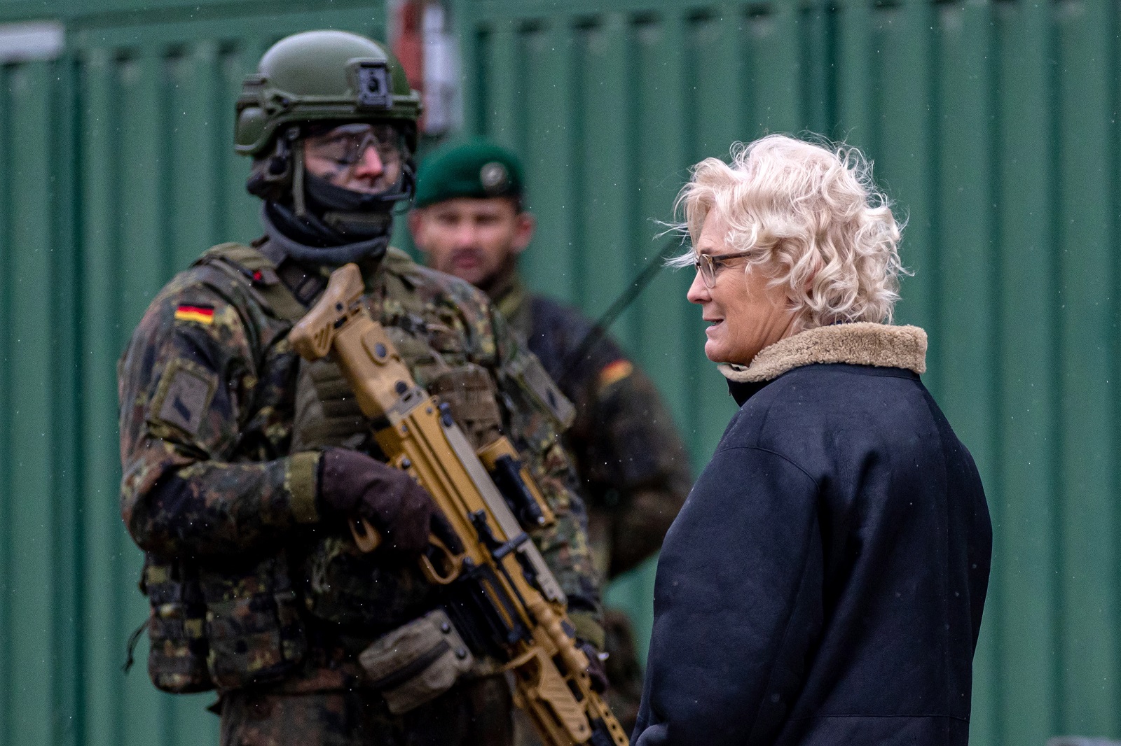 epa10401368 German Defense Minister Christine Lambrecht talks with soldiers during her visit at the Panzergrenadier Battalion 371, in Marienberg, Germany, 12 January 2023. According to the German military, since the Puma infantry fighting vehicles are currently not available, two companies of Panzergrenadier Battalion 371 (armoured infantry battalion) with their Marder infantry fighting vehicles are taking over this contribution to the NATO spearhead.  EPA/MARTIN DIVISEK