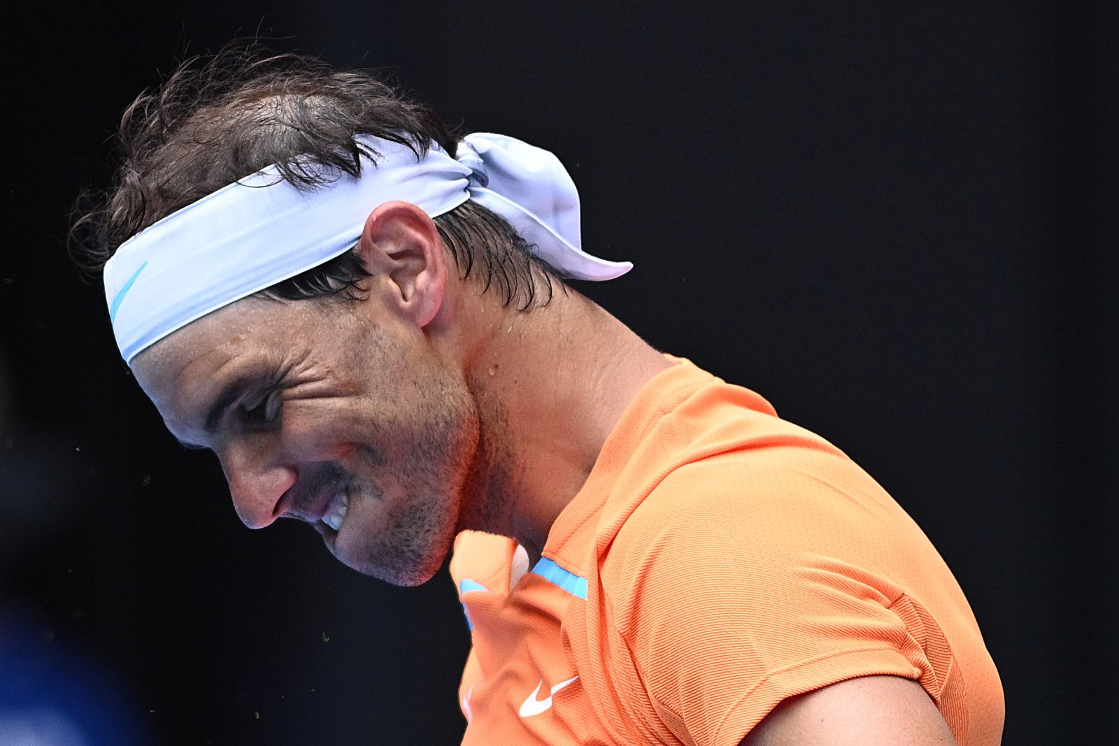 epa10408116 Rafael Nadal of Spain reacts during his Men's Singles 1st Round match against Jack Draper of Britain during the 2023 Australian Open tennis tournament at Melbourne Park in Melbourne, Australia, 16 January 2023.  EPA/JOEL CARRETT  AUSTRALIA AND NEW ZEALAND OUT