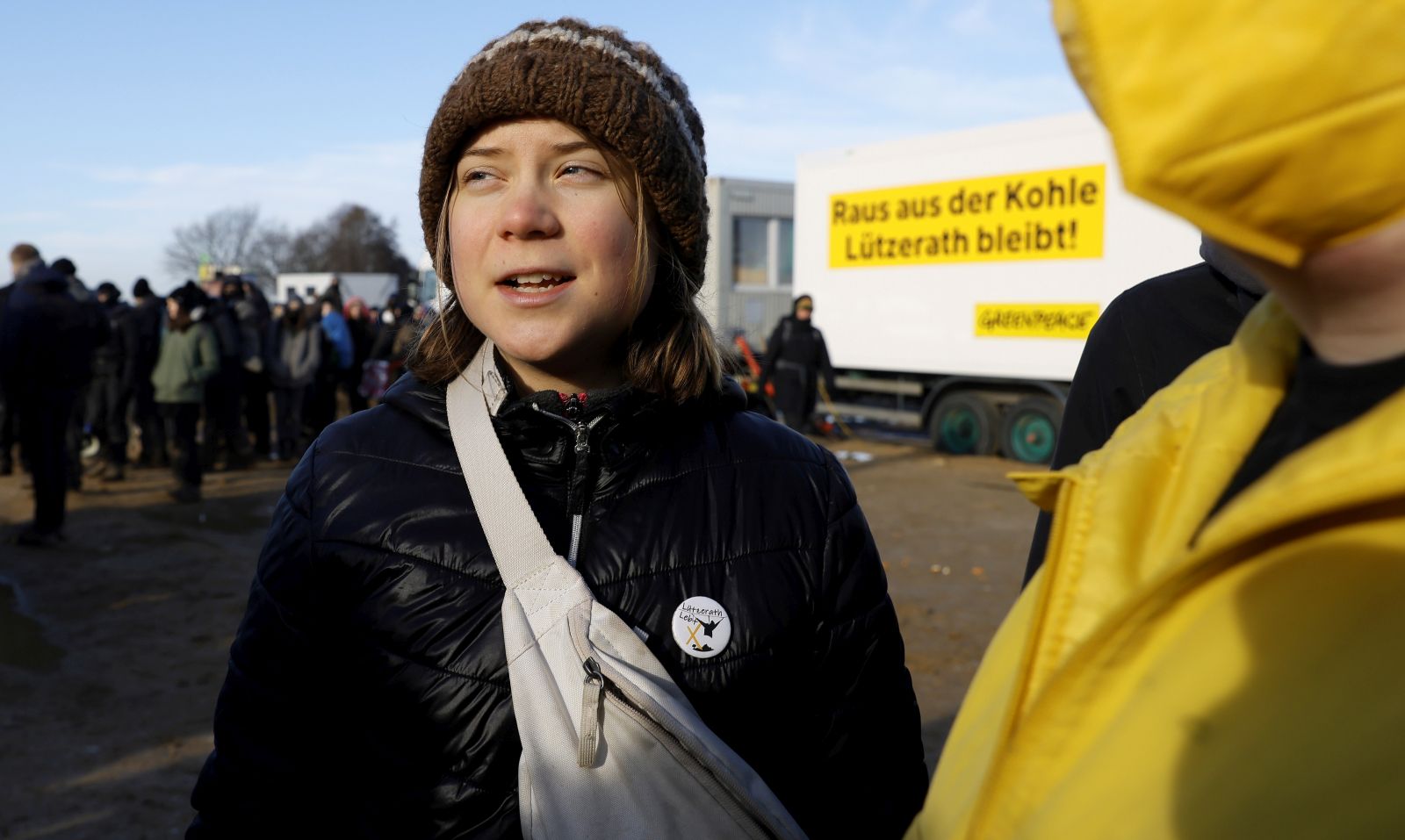 epa10410724 Swedish climate activist Greta Thunberg attends a rally of climate protection activists near the village of Luetzerath, Germany, 17 January 2023. The village of Luetzerath in North Rhine-Westphalia state is to make way for lignite mining despite the decision to phase out coal. The Garzweiler open pit mine, operated by German energy supplier RWE, is at the focus of protests by people who want Germany to stop mining and burning coal as soon as possible in the fight against climate change.  EPA/RONALD WITTEK