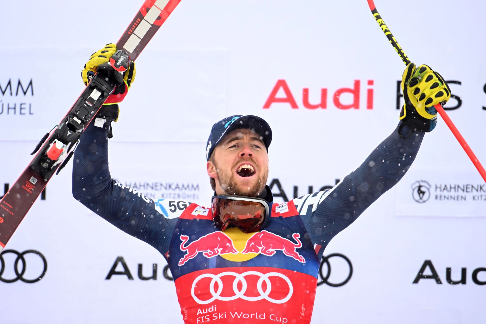 epa10420361 Winner Aleksander Aamodt Kilde of Norway celebrates on the podium for the Men's Downhill race of the FIS Alpine Skiing World Cup at the Streif ski course in Kitzbuehel, Austria, 21 January 2023.  EPA/CHRISTIAN BRUNA