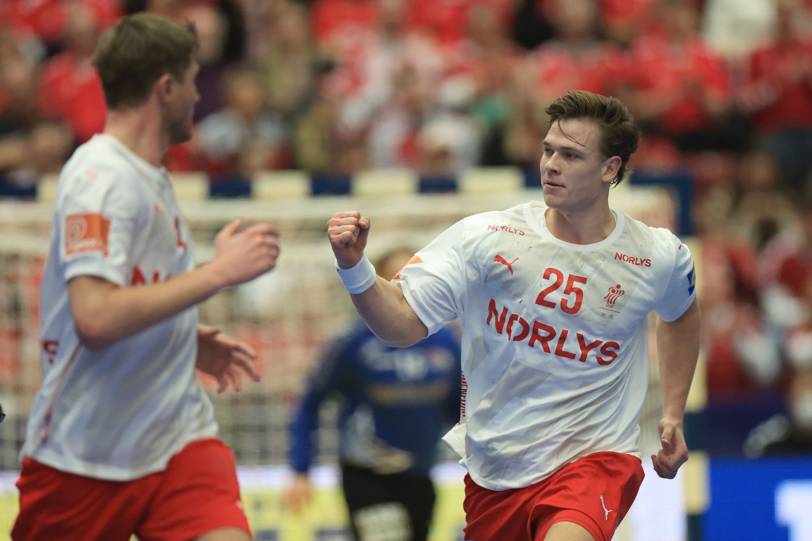 epa10421319 Denmark's Lukas Lindhard Jorgensen celebrates a goal during the IHF Men's World Championship Handball match, Main Round group 4, between USA and Denmark in Malmo, Sweden, 21 January 2023.  EPA/Andreas Hillergren  SWEDEN OUT