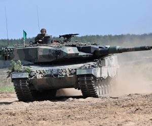 epa10424673 (FILE) - A 'Leopard 2PL' tank of the Polish army during the international exercise pk. DefenderEurope2022 at firing range Drawsko Pomorskie, northwest Poland, 27 May 2022 (reissued 23 January 2023). During a tour through the country, Polish Prime Minister Mateusz Morawiecki announced in Poznan on 23 January 2023, that Poland will 'formally ask Germany for permission to hand over some of its German-made Leopard 2 tanks to Ukraine', the Polish news agency PAP reported.  EPA/Marcin Bielecki POLAND OUT